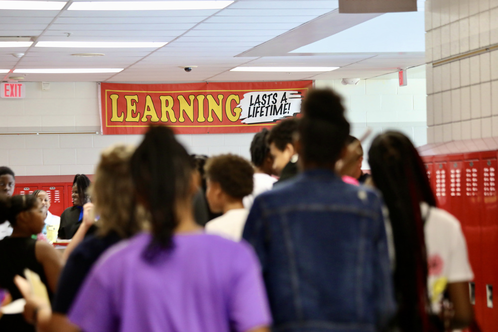 Students at Hayward Middle School walk the hallways during a class change